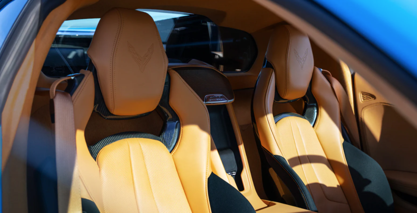 A car with yellow seats and black trim.
