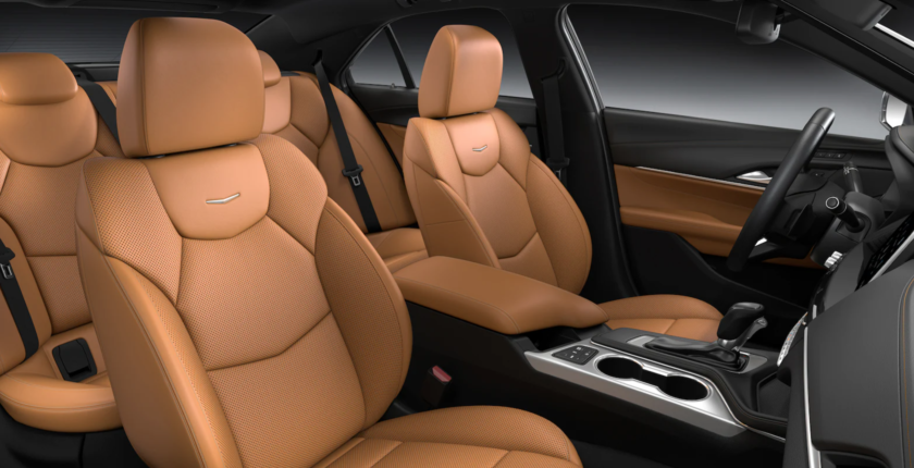 A car with tan leather seats and beige interior.