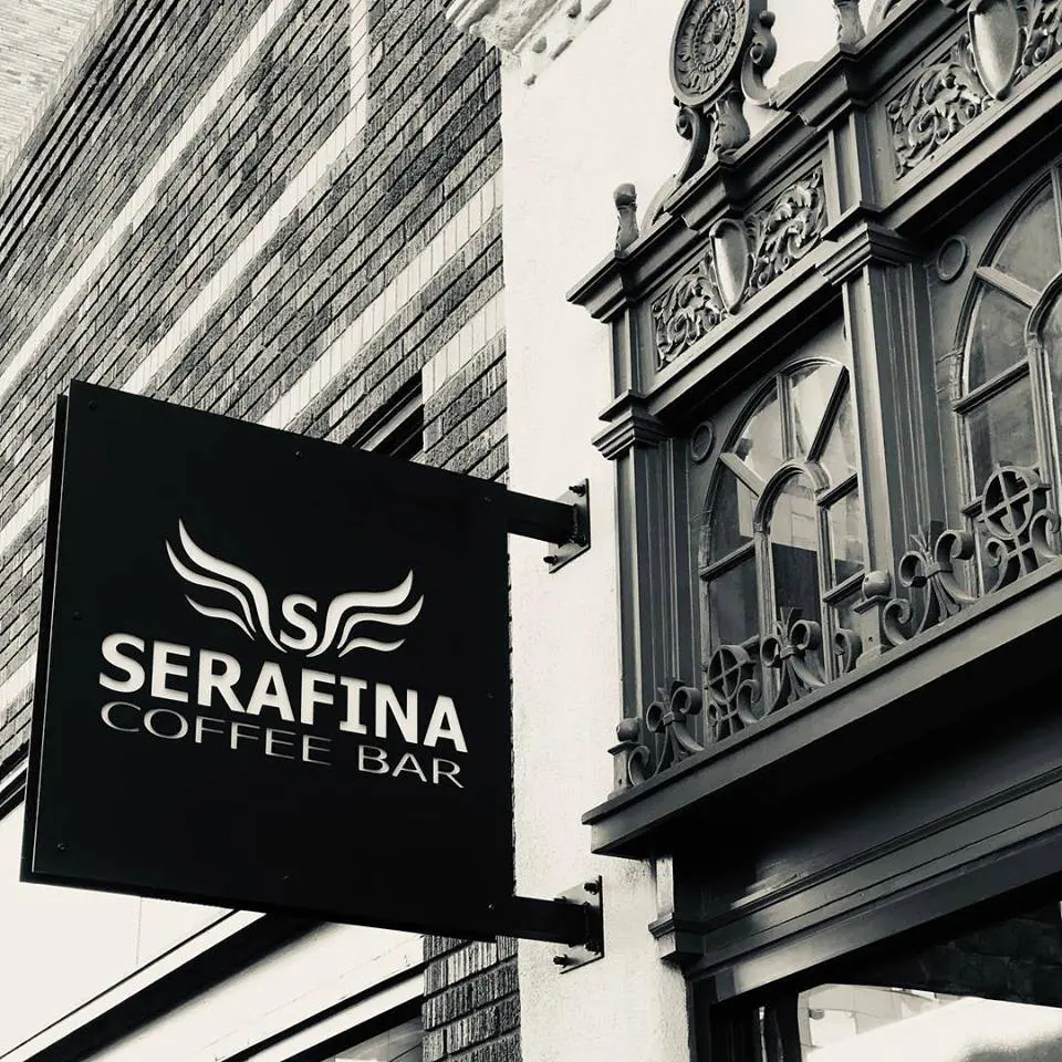 A black and white photo of serafina coffee bar.